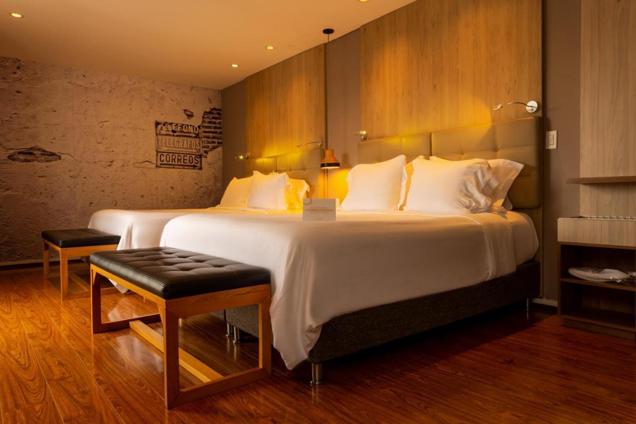 Quo Quality Hotel Manizales Bagian luar foto A bedroom at the hotel
