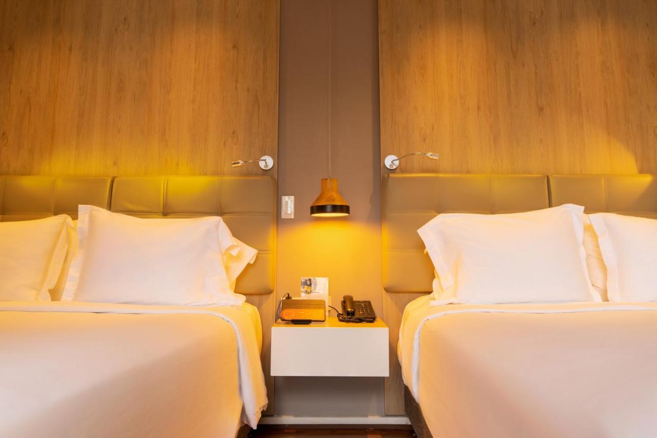 Quo Quality Hotel Manizales Bagian luar foto A room at the hotel