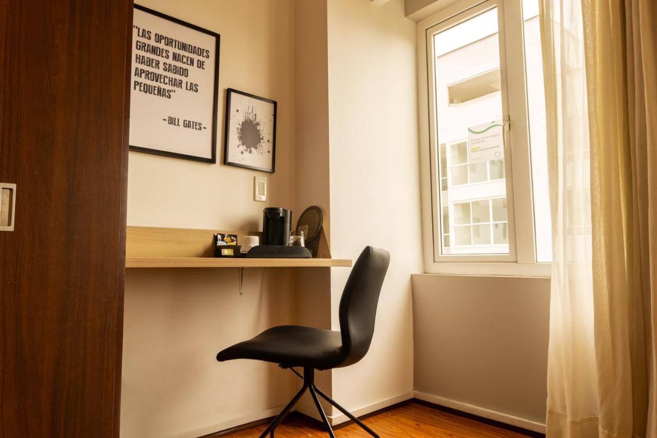 Quo Quality Hotel Manizales Bagian luar foto A typical study room