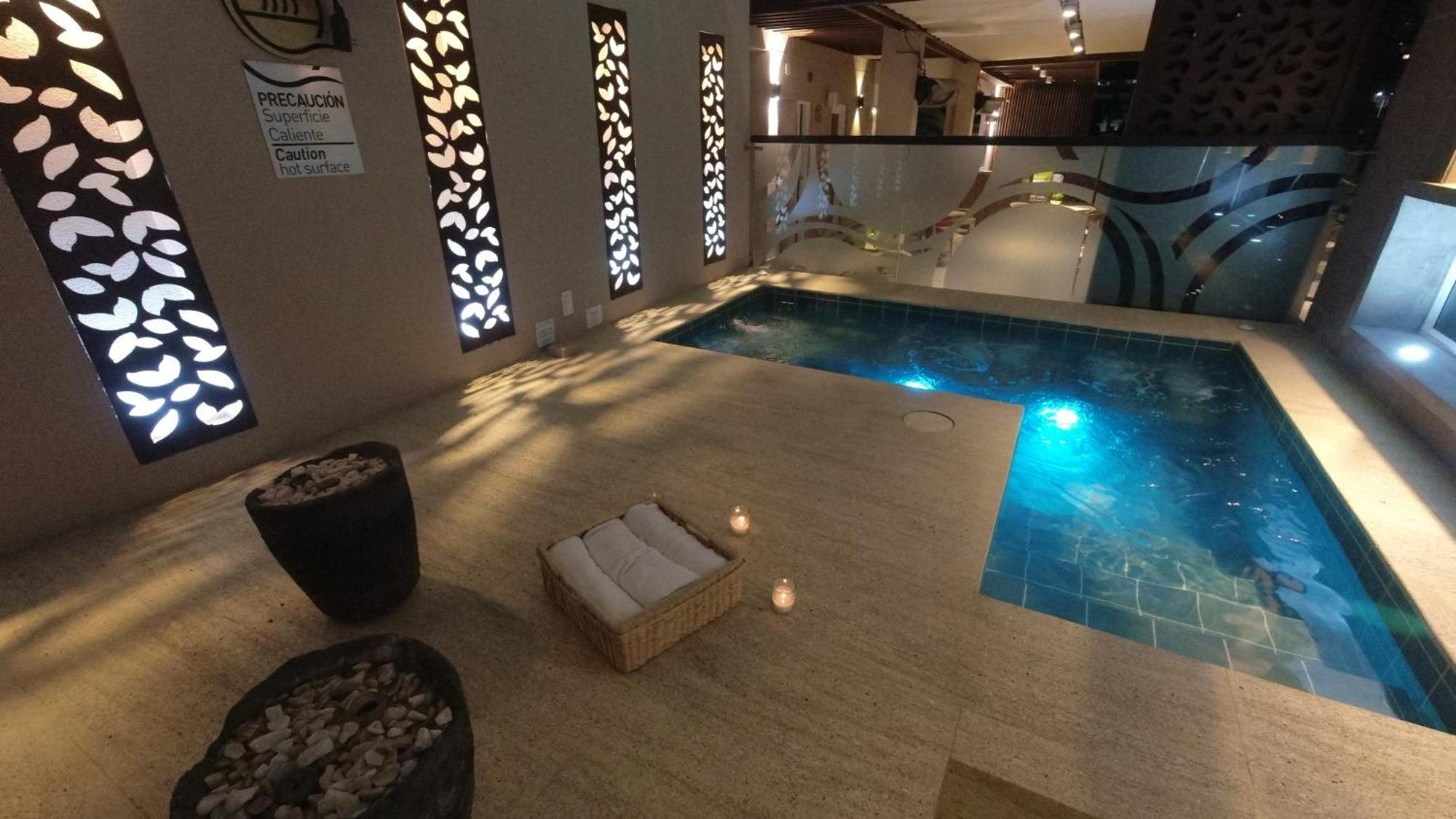 Quo Quality Hotel Manizales Bagian luar foto The pool at the spa